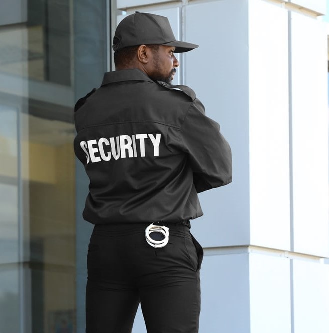image of a guard with their back turned and security witten across it
